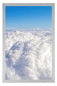 Plakat ponad chmurami
