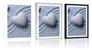 Plakat z passe-partout serce z kamienia na piaszczystym tle