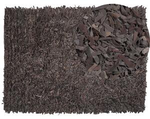 Ręcznie tkany dywan skórzany shaggy 160 x 230 cm brązowy Mut Beliani