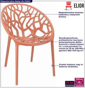 Jasnoczerwone ażurowe krzesło w stylu nowoczesnym - Moso