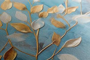 Obraz złoto-białe liście na niebieskim tle