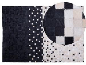 Dywan skórzany z włosiem 140x200 cm patchworkowy czarno-beżowy Erfelek Beliani