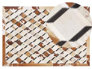 Dywan patchwork skórzany z wzorem 140 x 200 cm brązowy Serinova Beliani