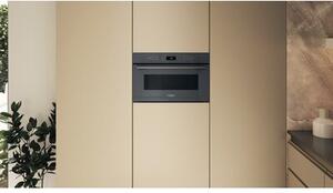 Kuchenka mikrofalowa WHIRLPOOL WMD7O4TSG 1000W Årednica 32.5 cm pojemnoÅÄ 31L SzÃ³sty zmysÅ Talerz Crisp Szary