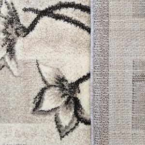 Szary prostokątny dywan w kwiaty - Berko
