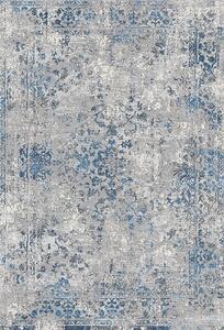 Niebieski wzorzysty dywan pokojowy przecierany - Izos 8X