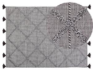 Dywan brązowy bawełniany haft w trójkąty z frędzlami 140 x 200 cm Tuzla Beliani