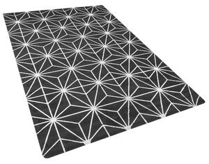 Nowoczesny dywan z wiskozy 160 x 230 cm złoty geometryczny wzór czarny Sibel Beliani