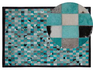 Nowoczesny dywan skórzany w kratę prostokątny 140 x 200 cm turkusowo-szary Nikfer Beliani