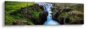 Obraz wodospadu między skałami (170x50 cm)