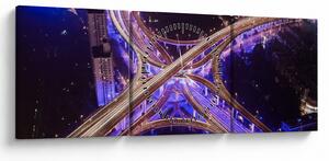 Obraz dużego skrzyżowania w nocy (z zegarem) (90x30 cm)