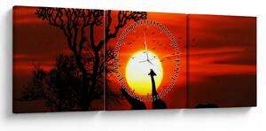 Obraz - Sylwetki zwierząt o zachodzie słońca (z zegarem) (90x30 cm)