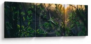 Obraz słońca przeświecającego przez gałęzie drzew (z zegarem) (90x30 cm)
