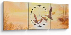Obraz - Żurawie o zachodzie słońca (z zegarem) (90x30 cm)