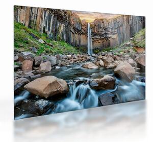 Obraz na szkle - Wodospad Svartifoss, Islandia (70x50 cm)