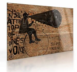 Obraz na szkle - Mężczyzna na rowerze w stylu Banksy (70x50 cm)