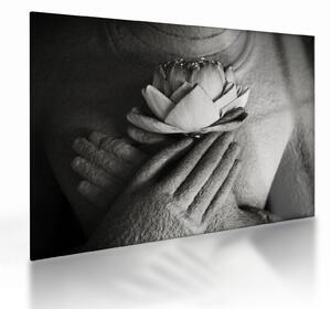 Obraz na szkle - Lotos w rękach Buddy (70x50 cm)