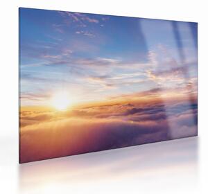 Obraz na szkle - Zachód słońca ponad chmurami (70x50 cm)