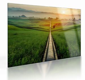 Obraz na szkle - Wschód słońca nad doliną (70x50 cm)