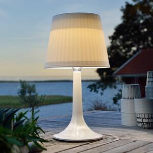 Konstsmide Biała solarna lampa stołowa LED Assisi Sitra