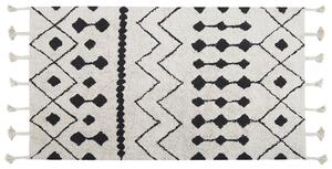 Dywan bawełniany geometryczny wzór z frędzlami 80x150cm biały czarny Khemisset Beliani