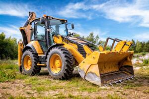 Ilustracja Yellow earth mover in construction site, ewg3D