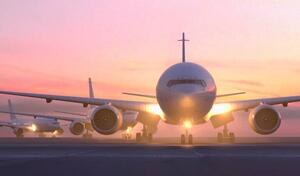 Ilustracja Airplanes taxiing on runway at sunset, Colin Anderson Productions pty ltd