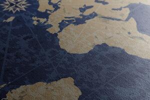 Obraz mapa świata z kompasem w stylu retro na niebieskim tle