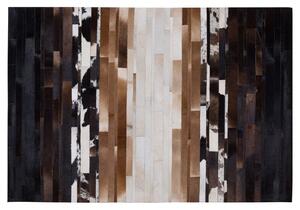 Nowoczesny dywan ze skóry naturalnej czarny beżowy 140 x 200 cm Dalyan Beliani