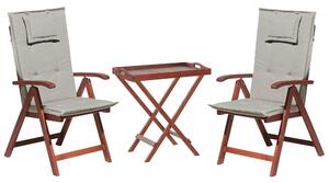 Zestaw mebli balkonowych drewno akacjowe stół 2 krzesła poduszki beżowoszare Toscana Beliani