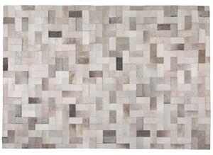 Nowoczesny dywan ze skóry bydlęcej do salonu szaro-beżowy 160 x 230 cm Korfez Beliani