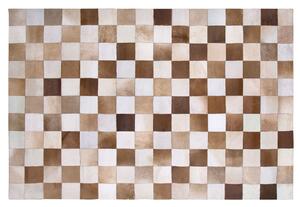 Rustykalny dywan chodnik skórzany prostokątny 140 x 200 cm brązowy Solmaz Beliani
