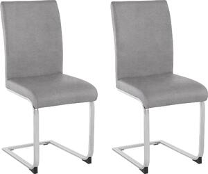 2 jasnoszare krzesła na metalowych płozach