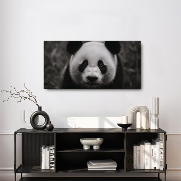 Obraz czarno-biała panda z uśmiechem