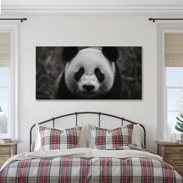 Obraz czarno-biała panda z uśmiechem
