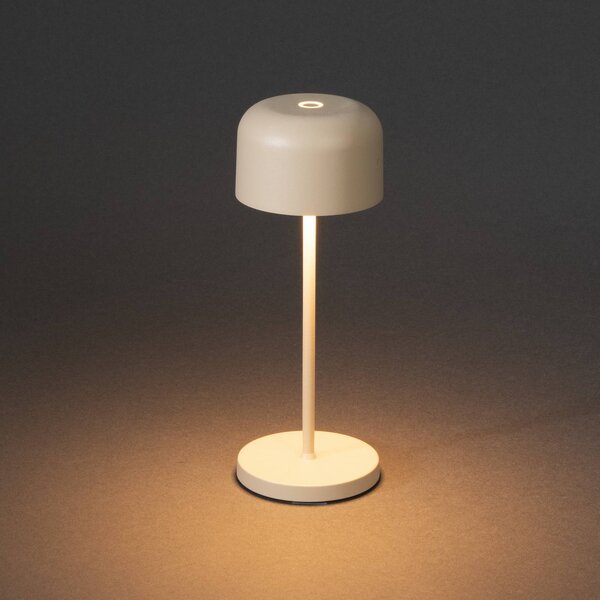 Konstsmide Lampa stołowa LED Lille, wysokość 20 cm, kolor piaskowy, IP54, USB możliwość ściemniania, kremowy / amber, salon / jadalnia, aluminium, nowoczesny