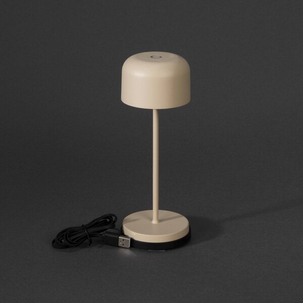 Konstsmide Lampa stołowa LED Lille, wysokość 20 cm, kolor piaskowy, IP54, USB możliwość ściemniania, kremowy / amber, salon / jadalnia, aluminium, nowoczesny
