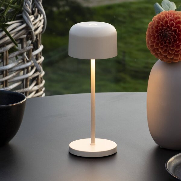 Konstsmide Lampa stołowa LED Lille, wysokość 20 cm, kolor piaskowy, IP54, USB możliwość ściemniania, kremowy / amber, salon / jadalnia, aluminium, nowoczesny