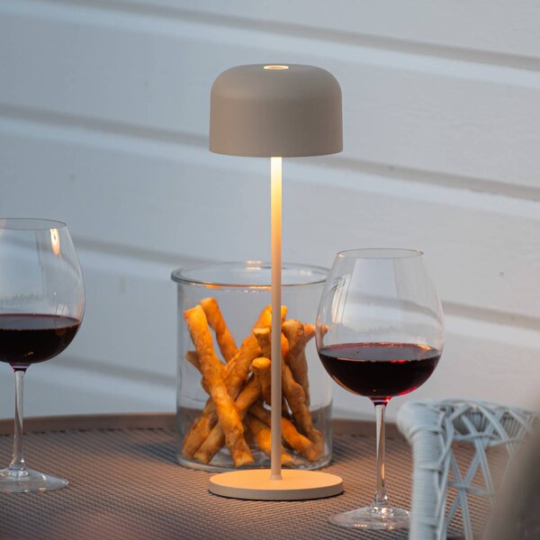Konstsmide Lampa stołowa LED Lille, wysokość 36 cm, kolor piaskowy, IP54, USB możliwość ściemniania, kremowy / amber, salon / jadalnia, aluminium, nowoczesny