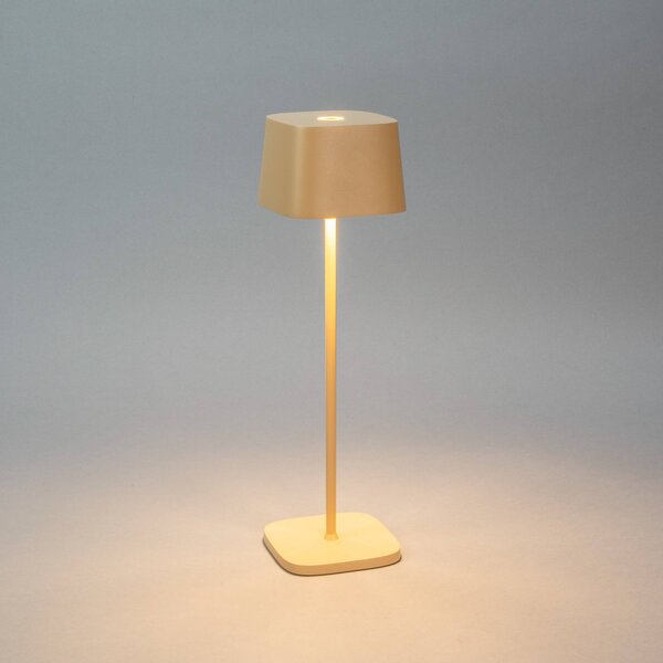Konstsmide Lampa stołowa LED z akumulatorem Capri, wysokość 36 cm, kolor piaskowy, IP54 możliwość ściemniania, kremowy / amber, salon / jadalnia, aluminium, nowoczesny