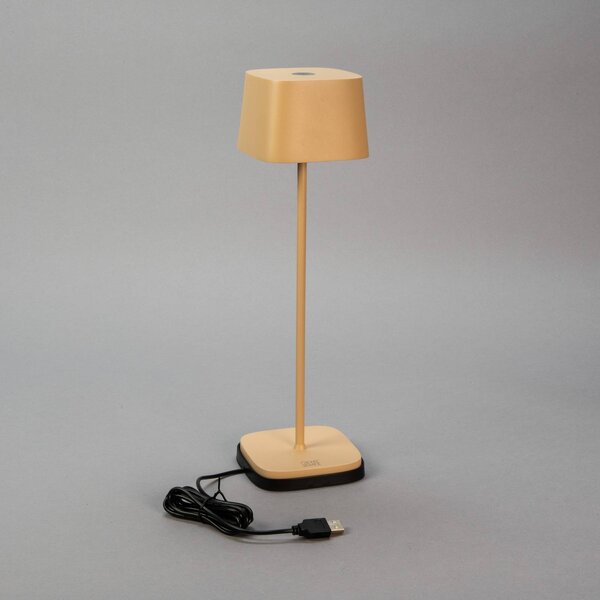 Konstsmide Lampa stołowa LED z akumulatorem Capri, wysokość 36 cm, kolor piaskowy, IP54 możliwość ściemniania, kremowy / amber, salon / jadalnia, aluminium, nowoczesny