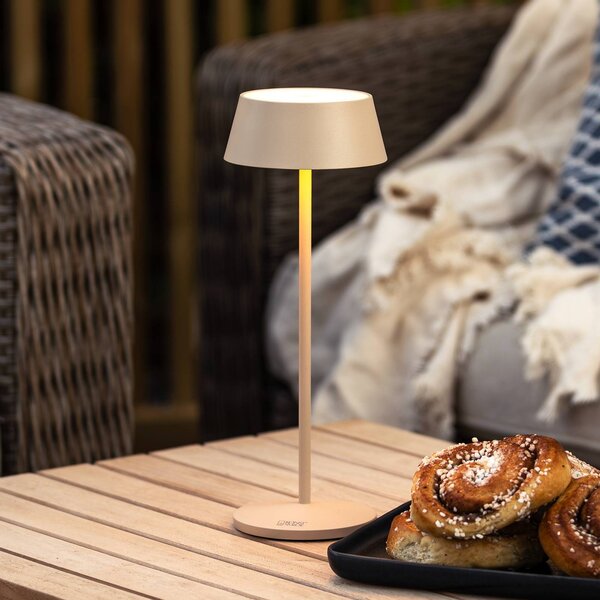Konstsmide Lampa stołowa LED z akumulatorem Menton, kolor piaskowy, wysokość 27 cm, IP54, możliwość ściemniania, kremowy / amber, salon / jadalnia, aluminium, nowoczesny