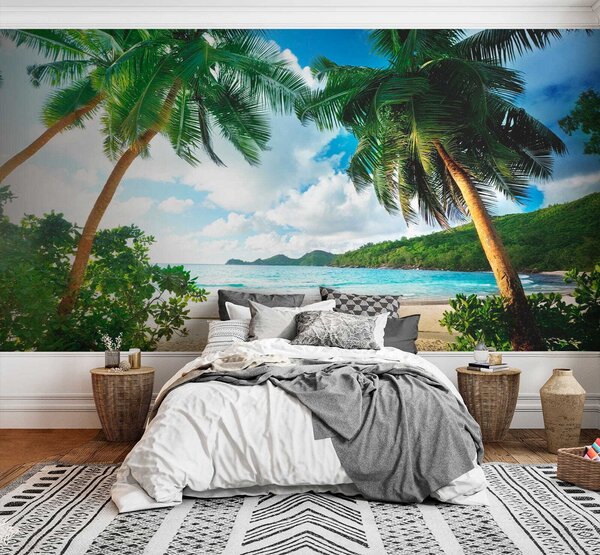 Fototapeta Plaża z palmami i błękitną wodą, Fototapety Morze i Plaża, Popularne Fototapety, u53753 - Tapeko.pl