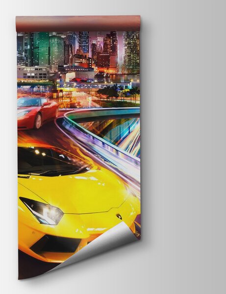 Fototapeta Żółte i czerwone samochody sportowe na drodze z miastem w tle, Fototapety design, Popularne Fototapety, u64341 - Tapeko.pl