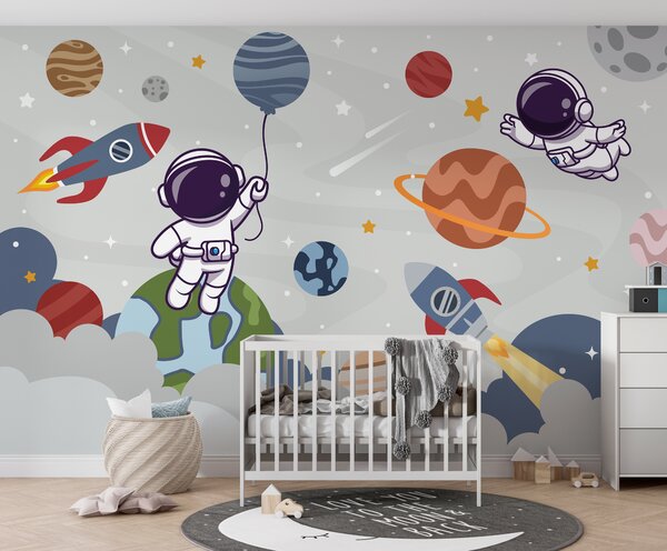Fototapeta Kreskówkowy astronauta w kosmosie z planetami i rakietą lecącą po niebie, Fototapety Dziecięce, Popularne Fototapety, u94476 - Tapeko.pl