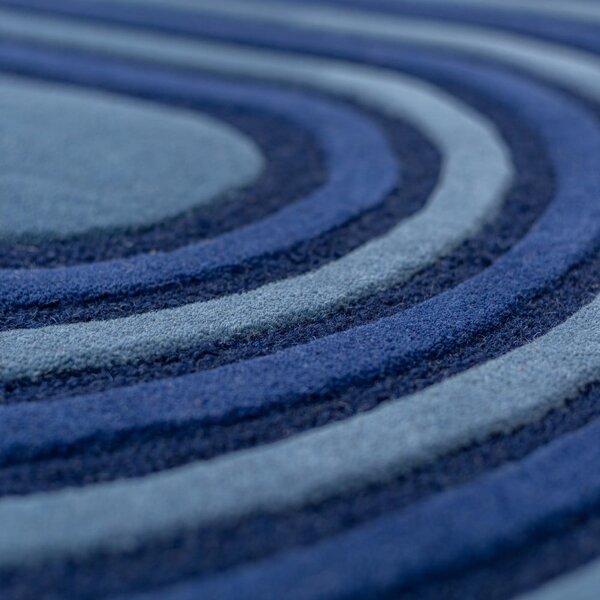 Ciemnoniebieski wełniany dywan tkany ręcznie 120x180 cm Conway Retro – Flair Rugs