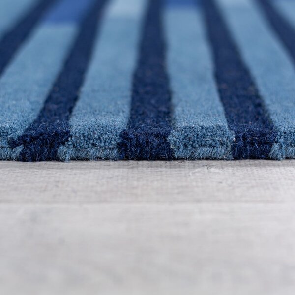 Ciemnoniebieski wełniany dywan tkany ręcznie 120x180 cm Conway Retro – Flair Rugs
