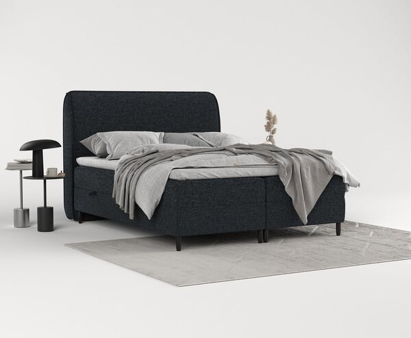 Czarne łóżko boxspring ze schowkiem 140x200 cm Melba – Maison de Rêve