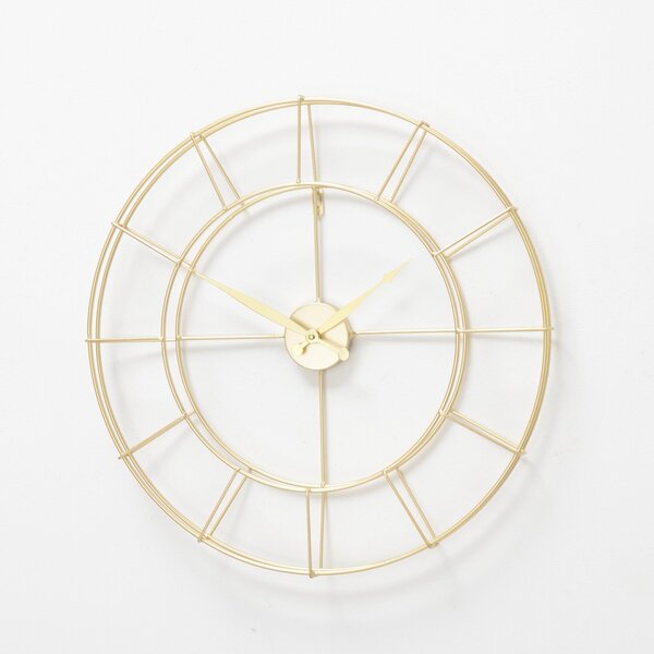 Ozdobny złoty zegar w nowoczesnym stylu