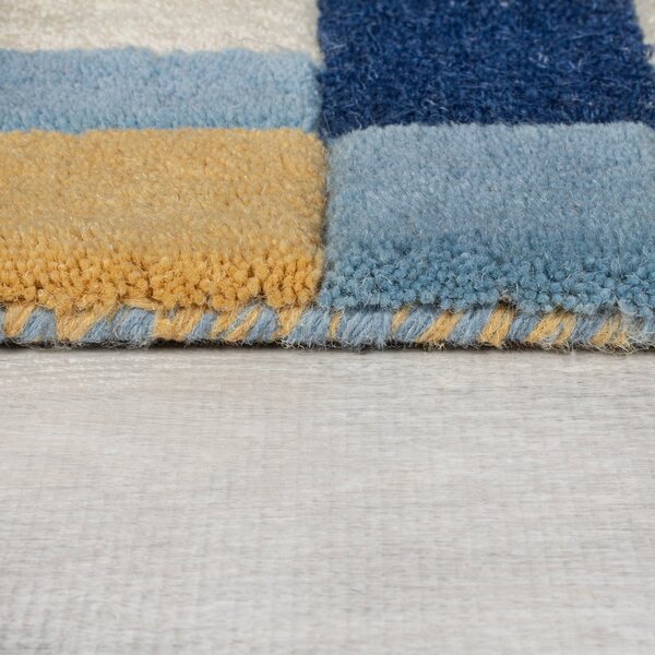 Niebieski wełniany dywan tkany ręcznie 120x170 cm Kai Wool Border – Flair Rugs